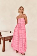 Printed and distinctive back-cut halter dress